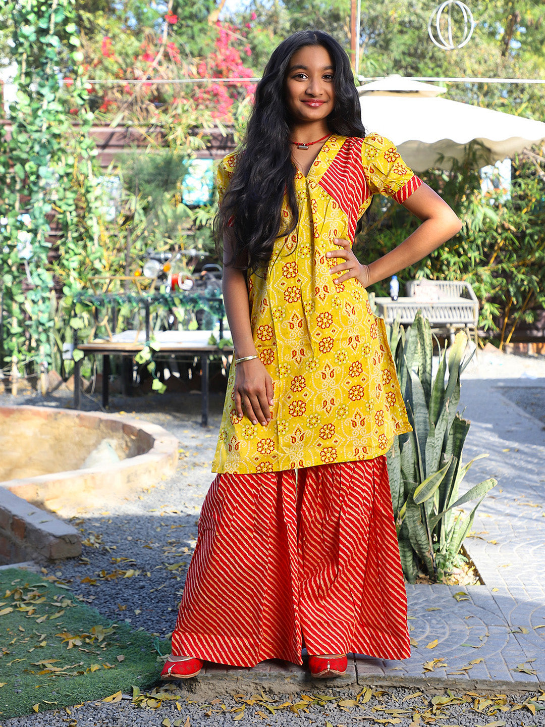 Yellow bandhani Kurta with red leheriya sharara