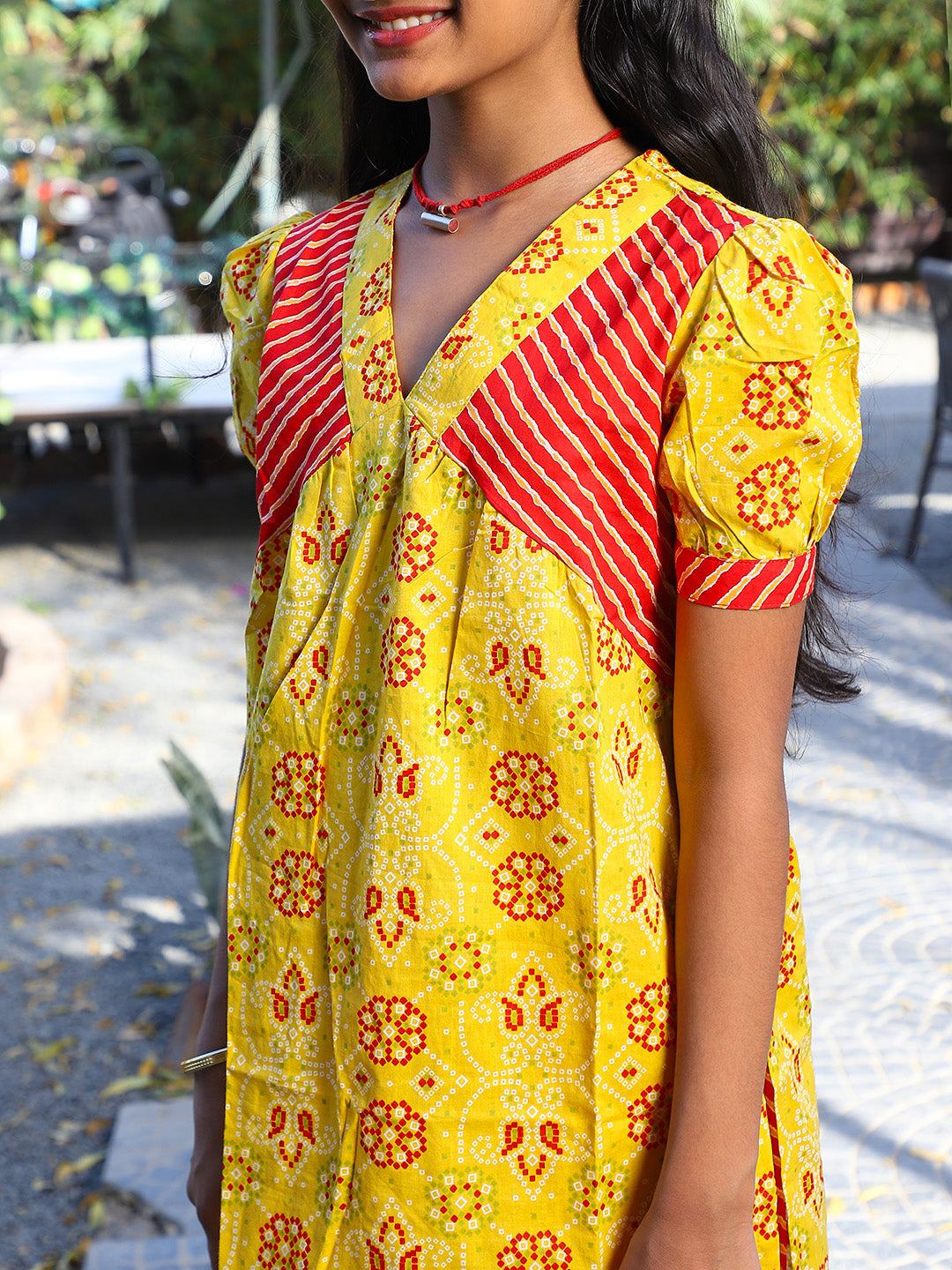 Yellow bandhani Kurta with red leheriya sharara